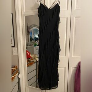 Sincerely Jules dress, stretchy material with with flowy details.